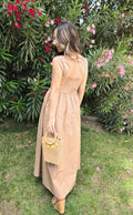 Shadow & Shine Desert Muse Maxi Dress in tan cotton with smocked bodice and adjustable straps. Flowy skirt.